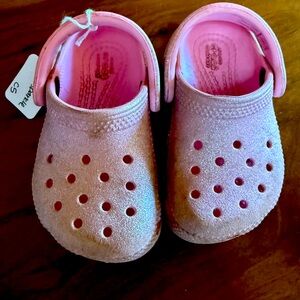 Crocs glittery pink baby shoes